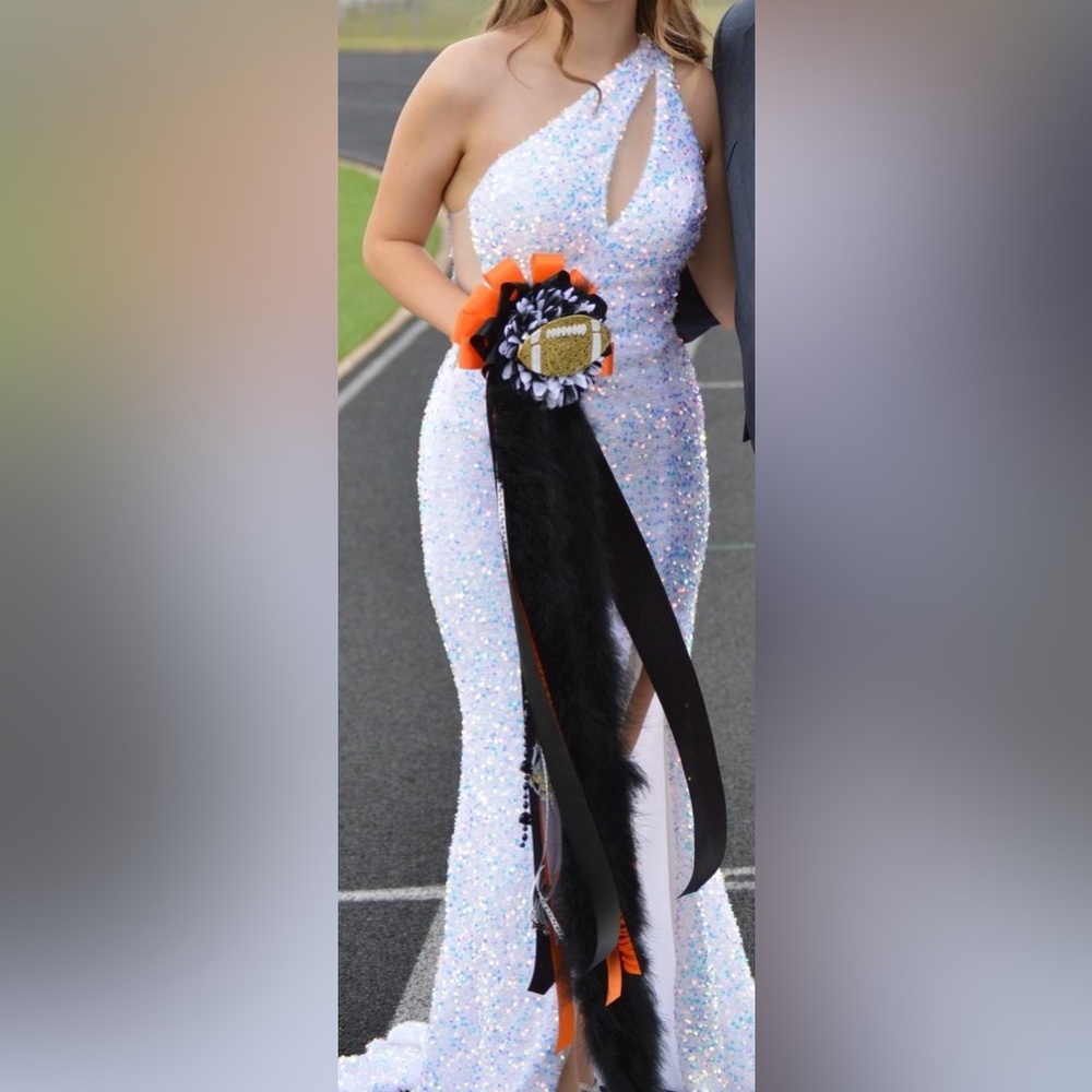 Selling a white Prom dress only worn once for a homecoming court.